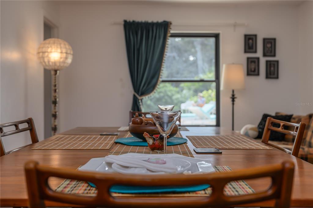 4790 Michael Lane Ponce Inlet, FL 32127 - Photo 14 of 28 a living room with furniture and wooden floor