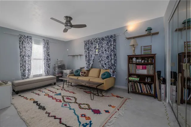 a living room with furniture and window