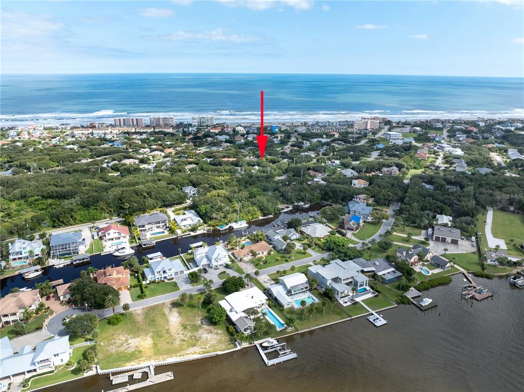 4790 Michael Lane Ponce Inlet, FL 32127 - Photo 5 of 28 an aerial view of residential houses with outdoor space and ocean view