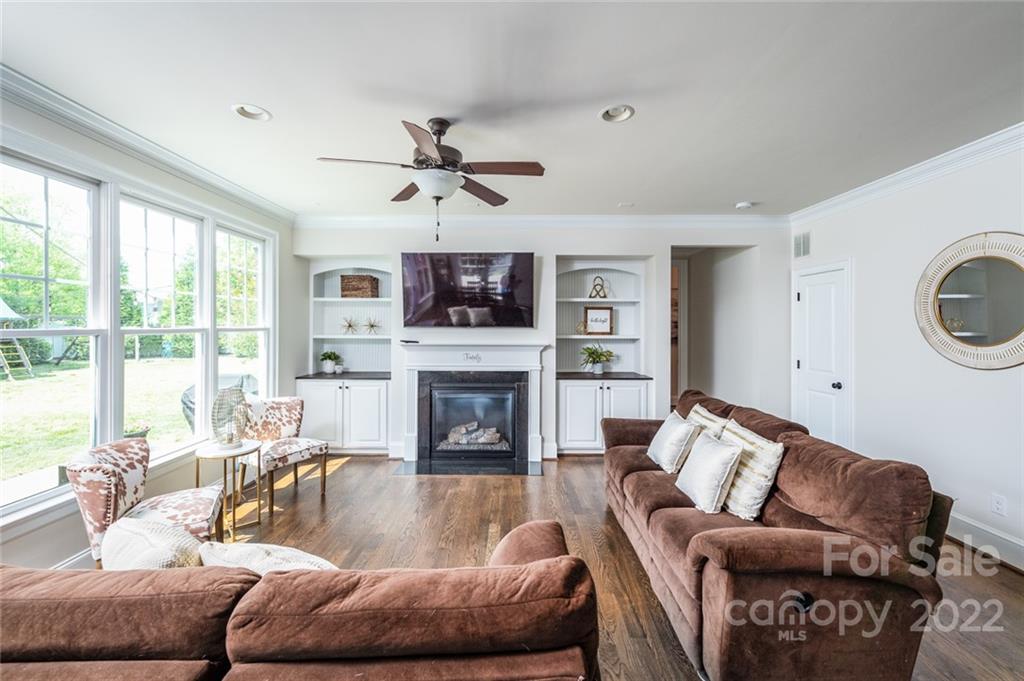 6009 Daphne Circle Fort Mill, SC 29708 - Photo 11 of 43 a living room with furniture fireplace and a large window