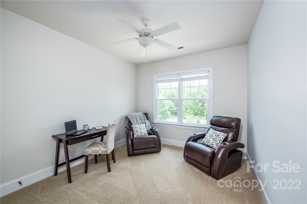 6009 Daphne Circle Fort Mill, SC 29708 - Photo 22 of 43 a living room with furniture and a window