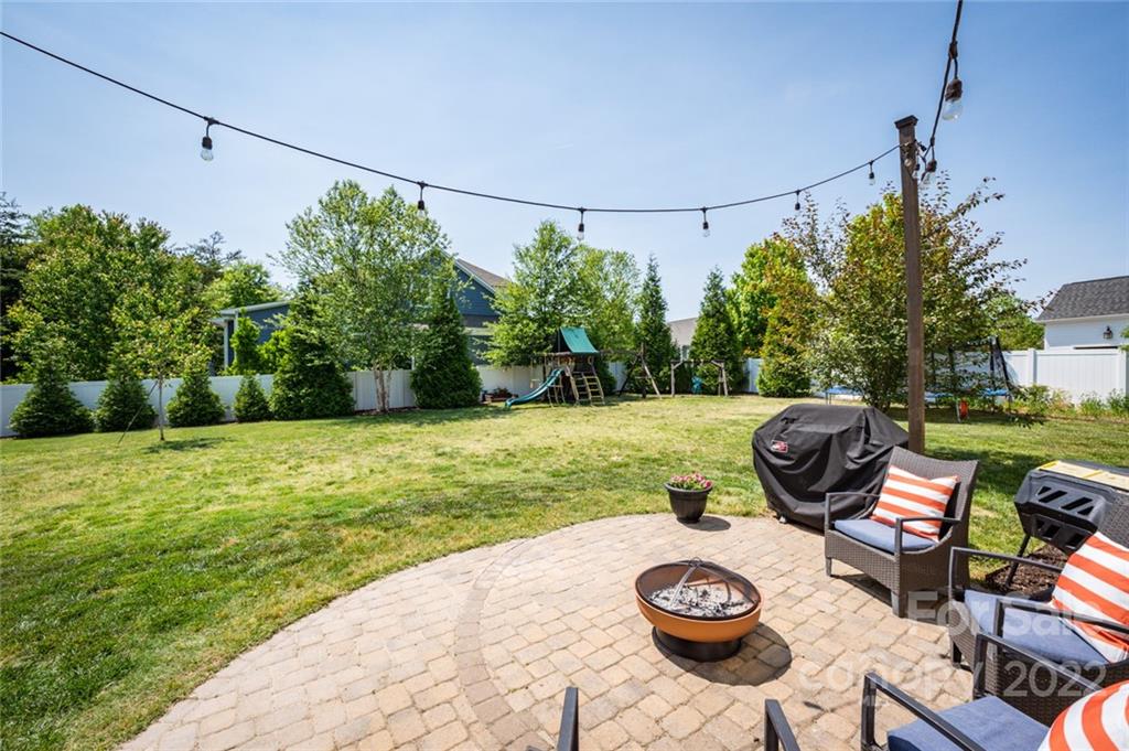 6009 Daphne Circle Fort Mill, SC 29708 - Photo 32 of 43 a backyard of a house with table and chairs