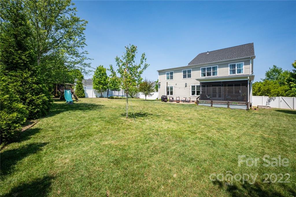 6009 Daphne Circle Fort Mill, SC 29708 - Photo 35 of 43 a house view with a sitting space and garden