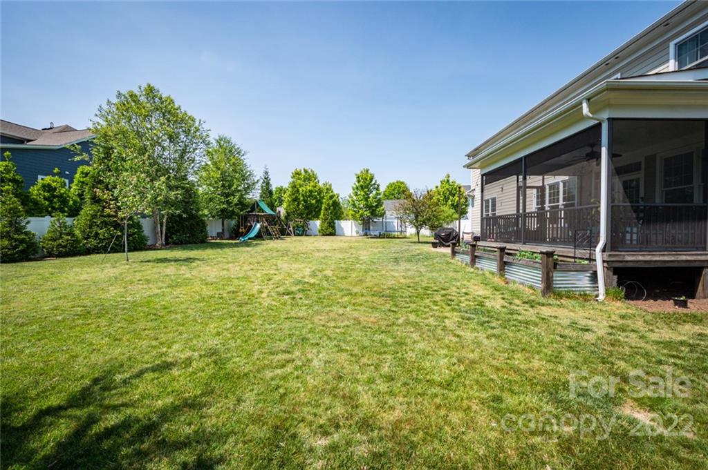 6009 Daphne Circle Fort Mill, SC 29708 - Photo 36 of 43 a swimming pool with outdoor seating and yard