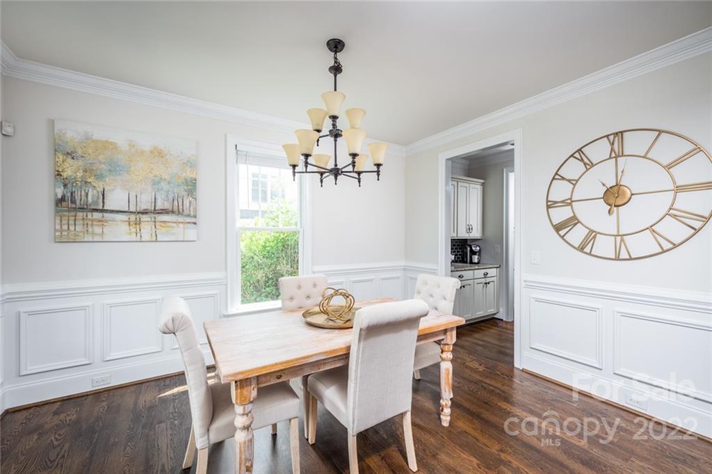 6009 Daphne Circle Fort Mill, SC 29708 - Photo 4 of 43 a view of a dining room with furniture window and wooden floor