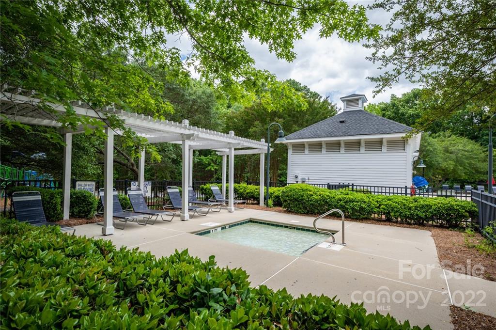 6009 Daphne Circle Fort Mill, SC 29708 - Photo 41 of 43 a house with garden in front of it