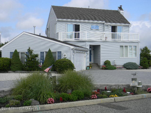 128 Clifton Road Barnegat, NJ 08005 - Photo 1 of 24 front view of a house with a small yard