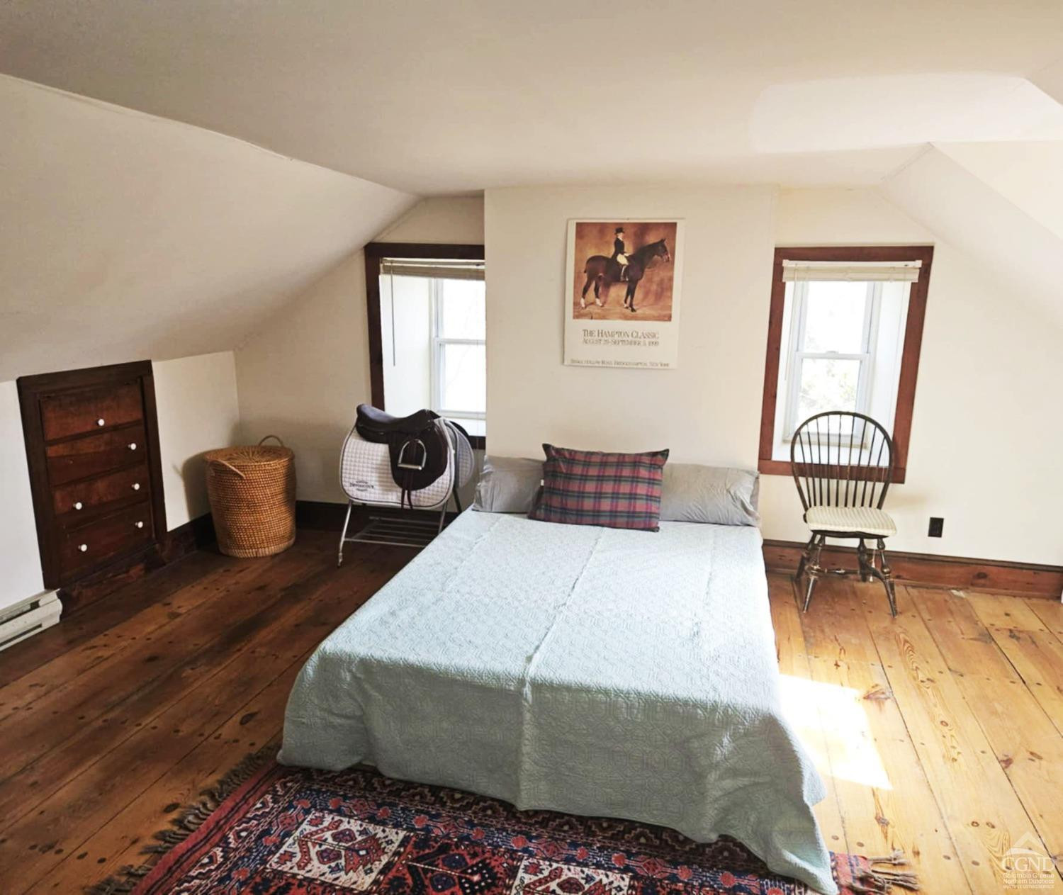 266 Fingar Road Hudson, NY 12534 - Photo 13 of 20 a bedroom with a bed and wooden floor