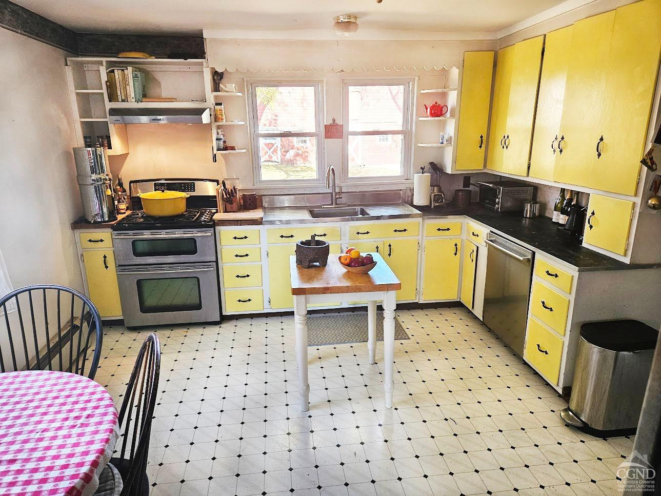 266 Fingar Road Hudson, NY 12534 - Photo 16 of 20 a kitchen with a stove a sink and a microwave