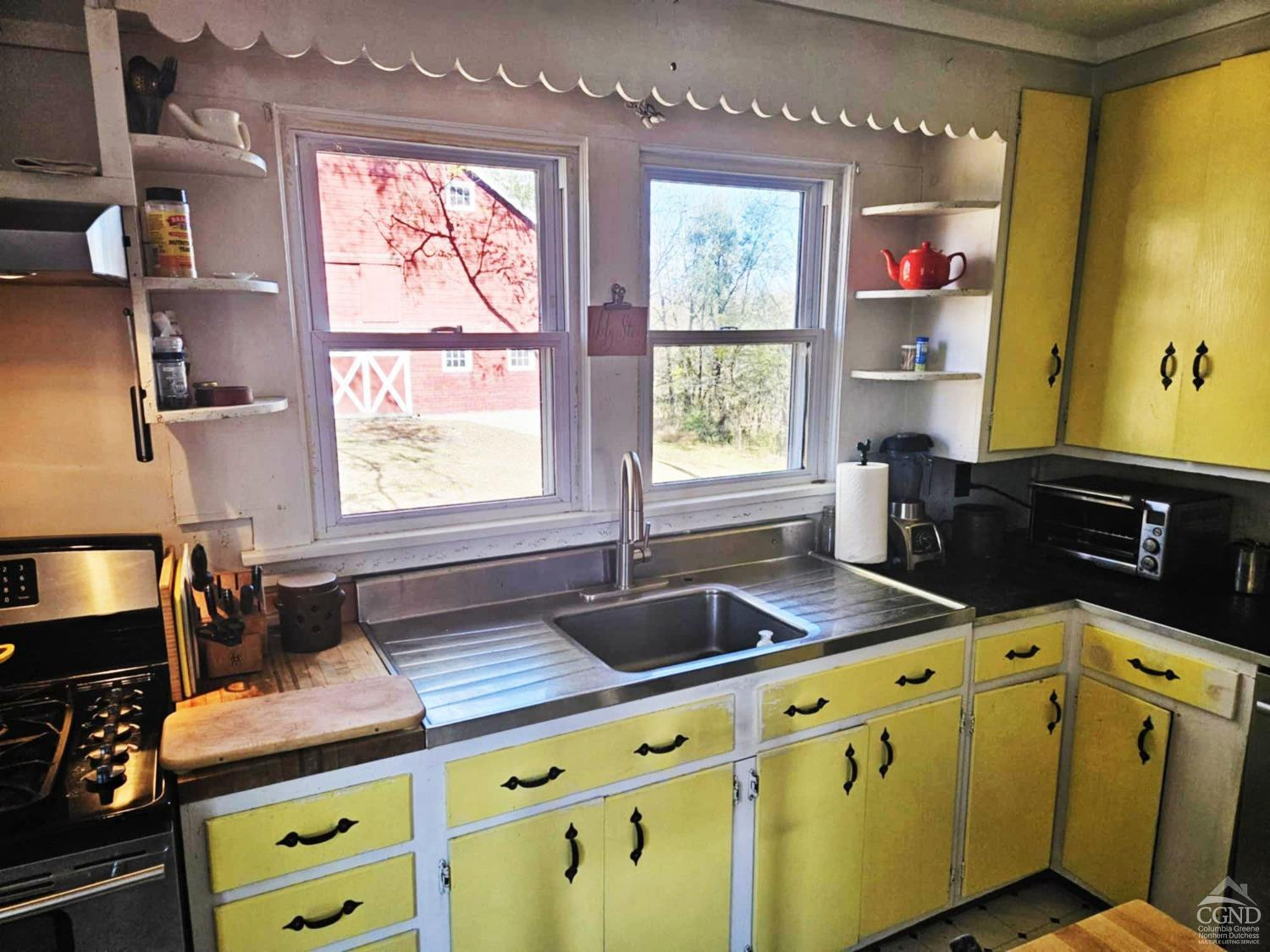266 Fingar Road Hudson, NY 12534 - Photo 17 of 20 a kitchen that has a sink and a stove in it