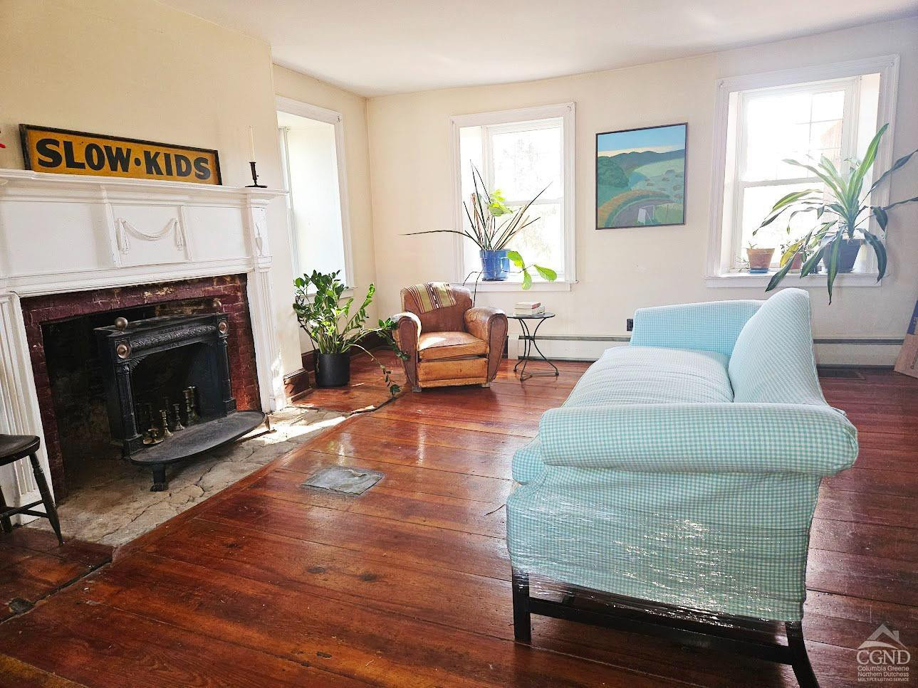 266 Fingar Road Hudson, NY 12534 - Photo 19 of 20 a living room with furniture and a fireplace