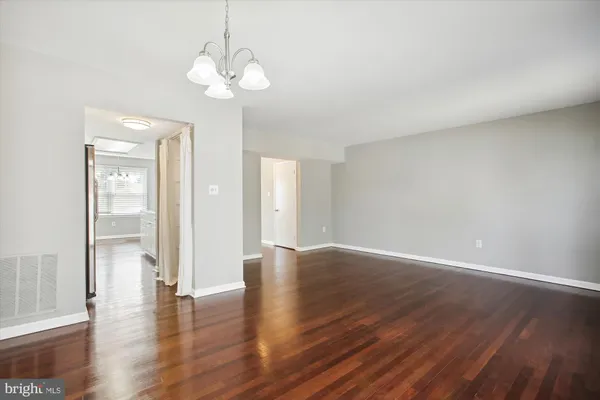 a view of livingroom with hardwood floor and window