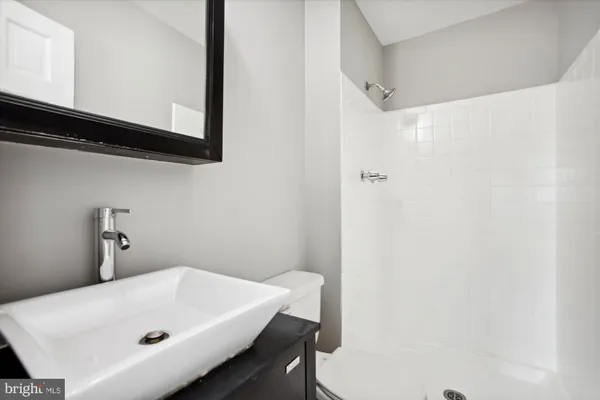 a bathroom with a white bath tub