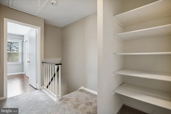 a view of entryway with wooden floor
