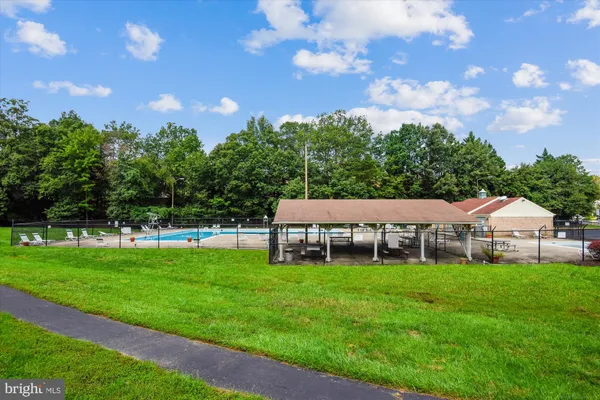 a view of a house with a big yard