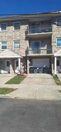 a front view of a building with street