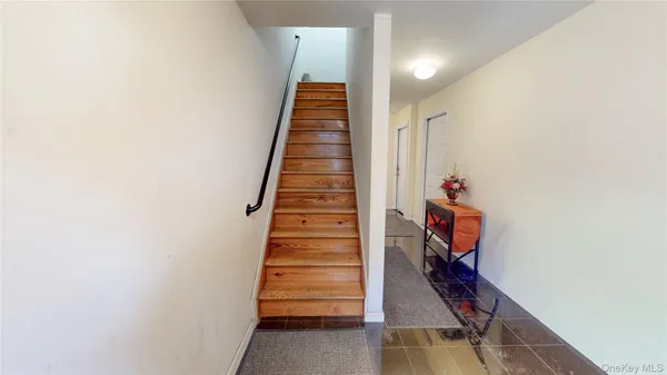 a view of an entryway with staircase