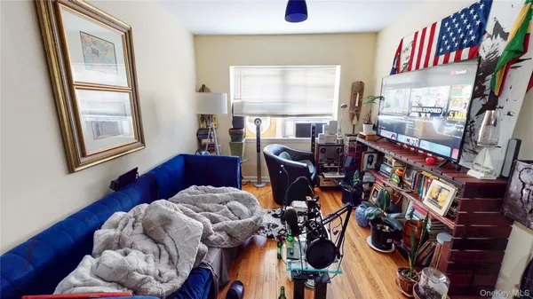 a view of a livingroom with furniture and windows