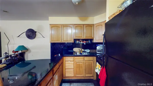 a bedroom with a bed and a windows