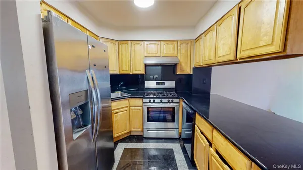 a view of a room with wooden floor and closet