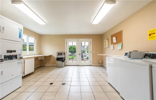 a kitchen with appliances cabinets and a sink