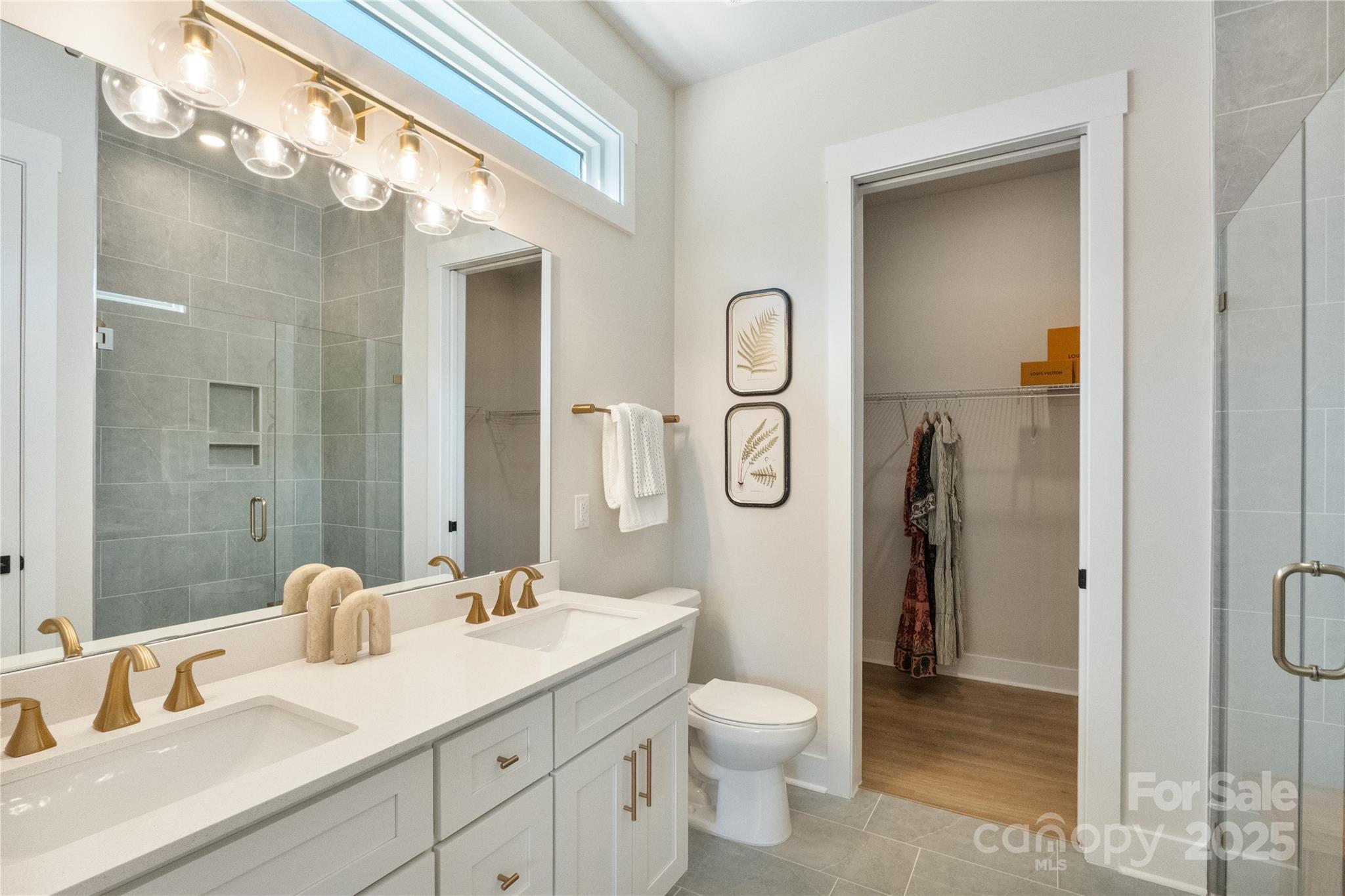 2081 Bonds Lane, Unit 27 Fort Mill, SC 29715 - Photo 27 of 46 a bathroom with a granite countertop sink toilet and shower