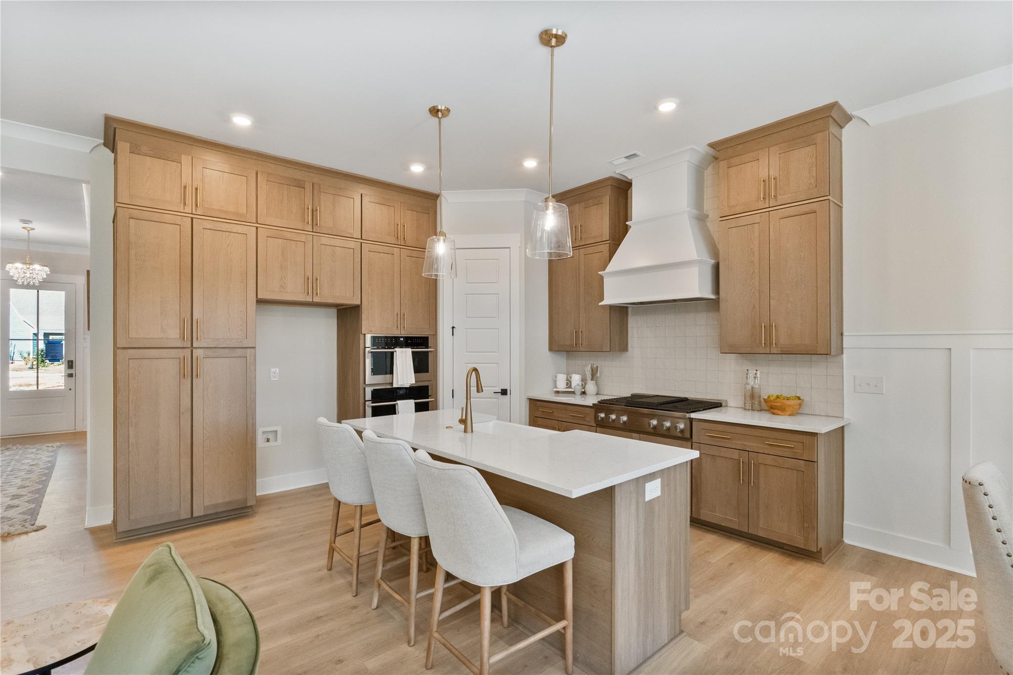 2081 Bonds Lane, Unit 27 Fort Mill, SC 29715 - Photo 8 of 46 a kitchen with a sink a counter space appliances and cabinets