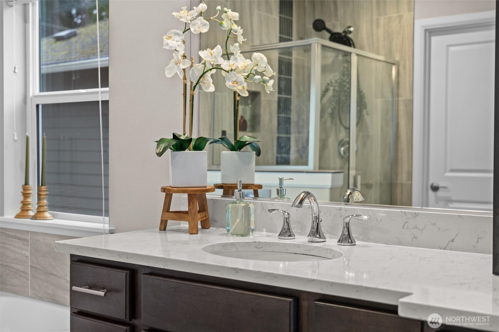 23617 44th Drive Southeast Bothell, WA 98021 - Photo 21 of 40 a bathroom with a sink and a mirror
