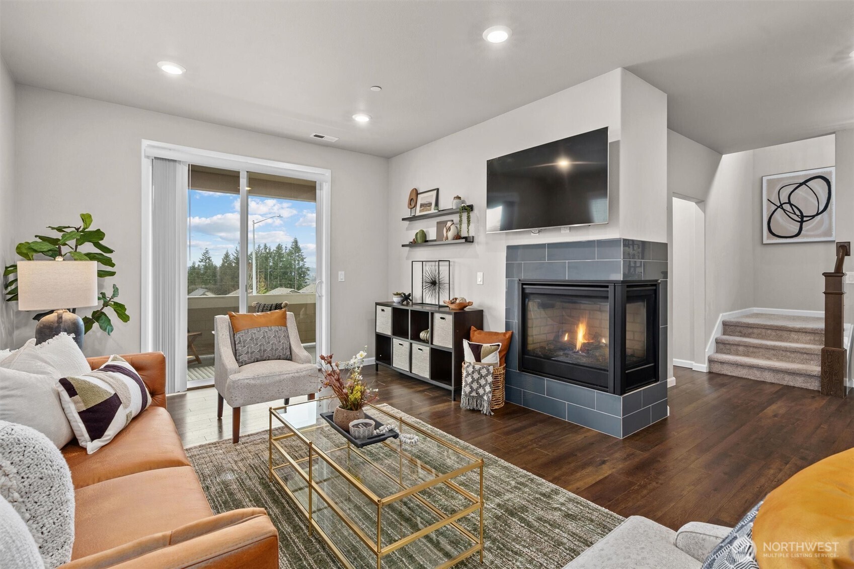 23617 44th Drive Southeast Bothell, WA 98021 - Photo 3 of 40 a living room with furniture fireplace and flat screen tv