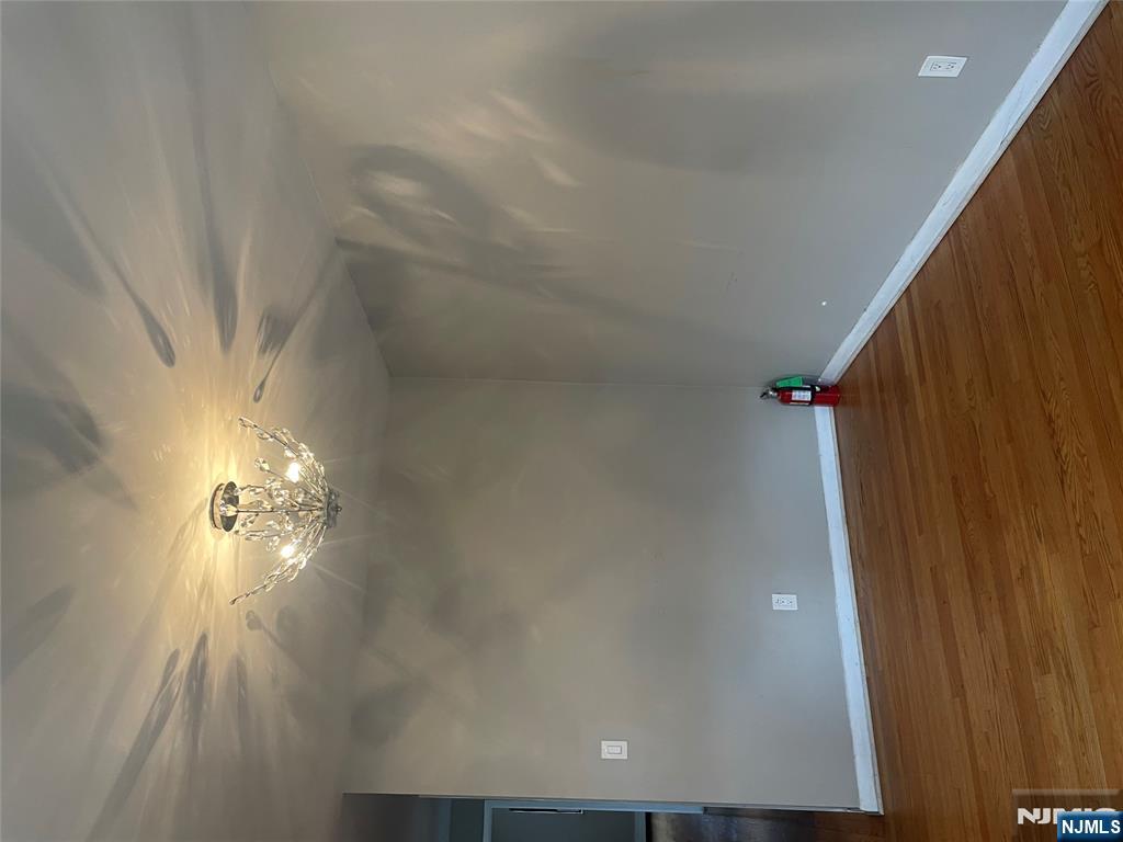 232-230 Anderson Avenue, Unit 3A Fairview, NJ 07022 - Photo 2 of 11 a view of empty room with wooden floor