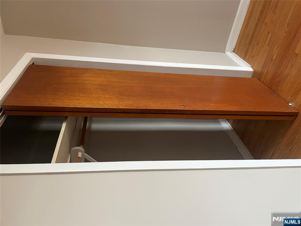 232-230 Anderson Avenue, Unit 3A Fairview, NJ 07022 - Photo 8 of 11 a view of a hallway with wooden floor