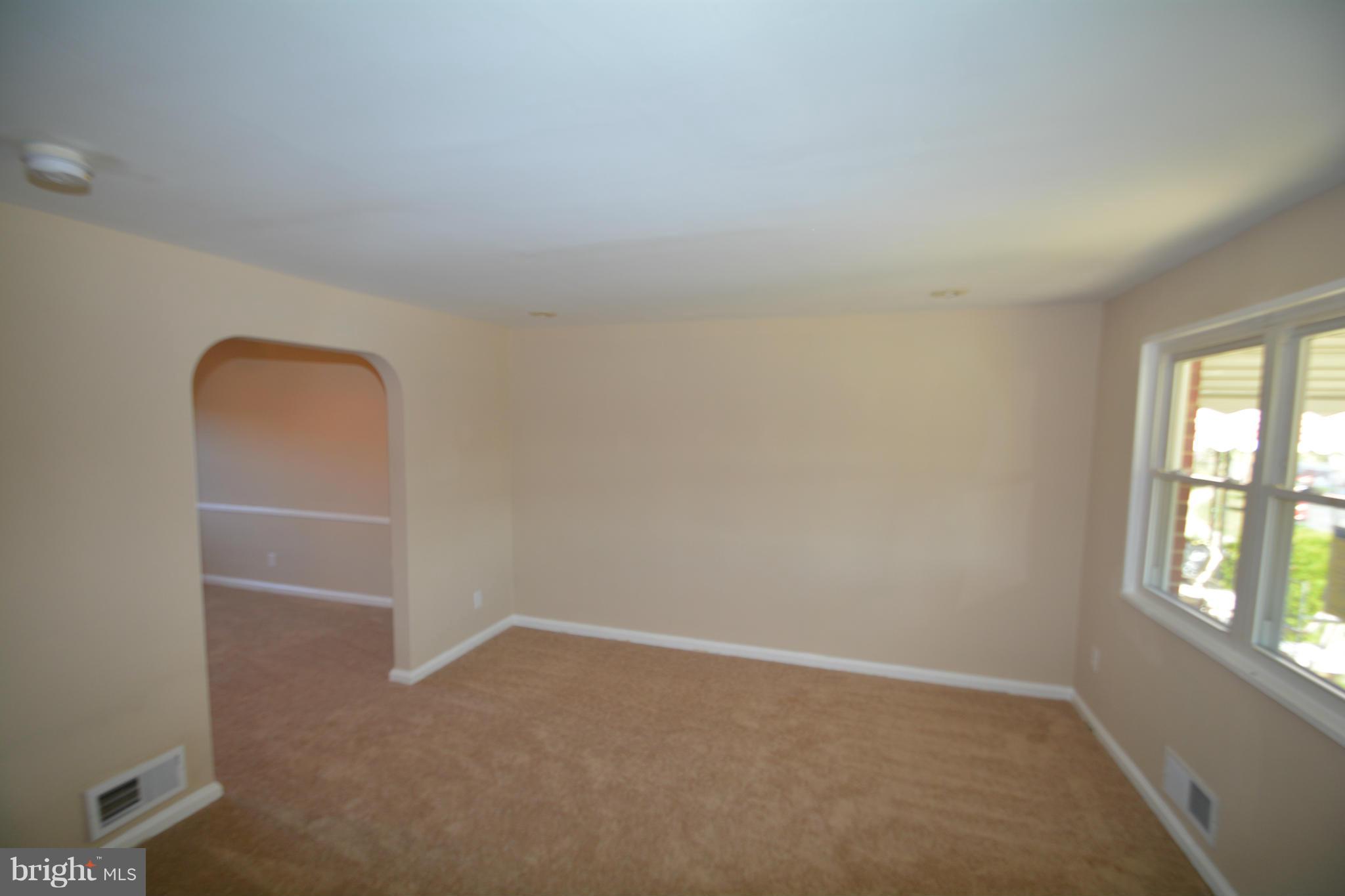 5454 Whitlock Road Baltimore, MD 21229 - Photo 15 of 30 an empty room with windows