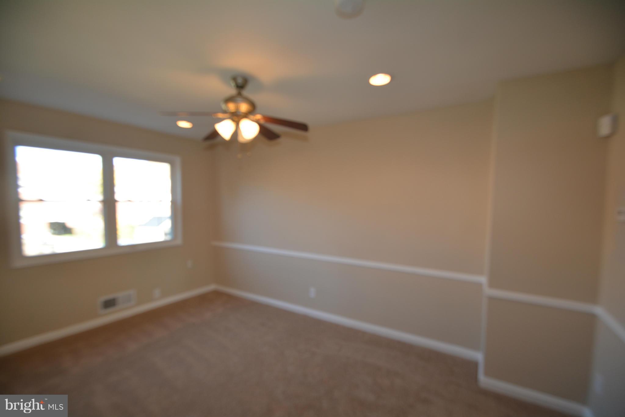 5454 Whitlock Road Baltimore, MD 21229 - Photo 16 of 30 an empty room with a window