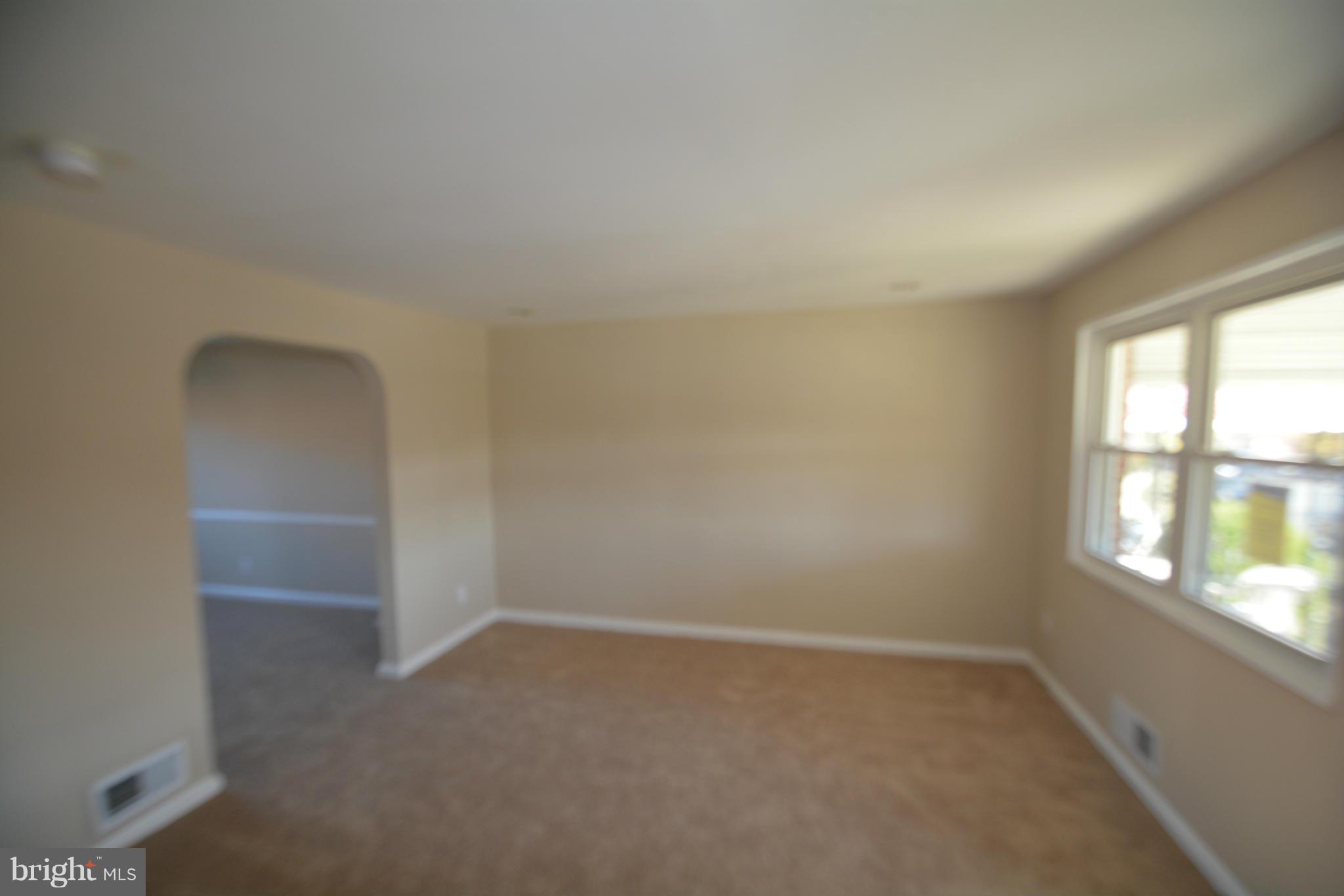 5454 Whitlock Road Baltimore, MD 21229 - Photo 17 of 30 an empty room with a window