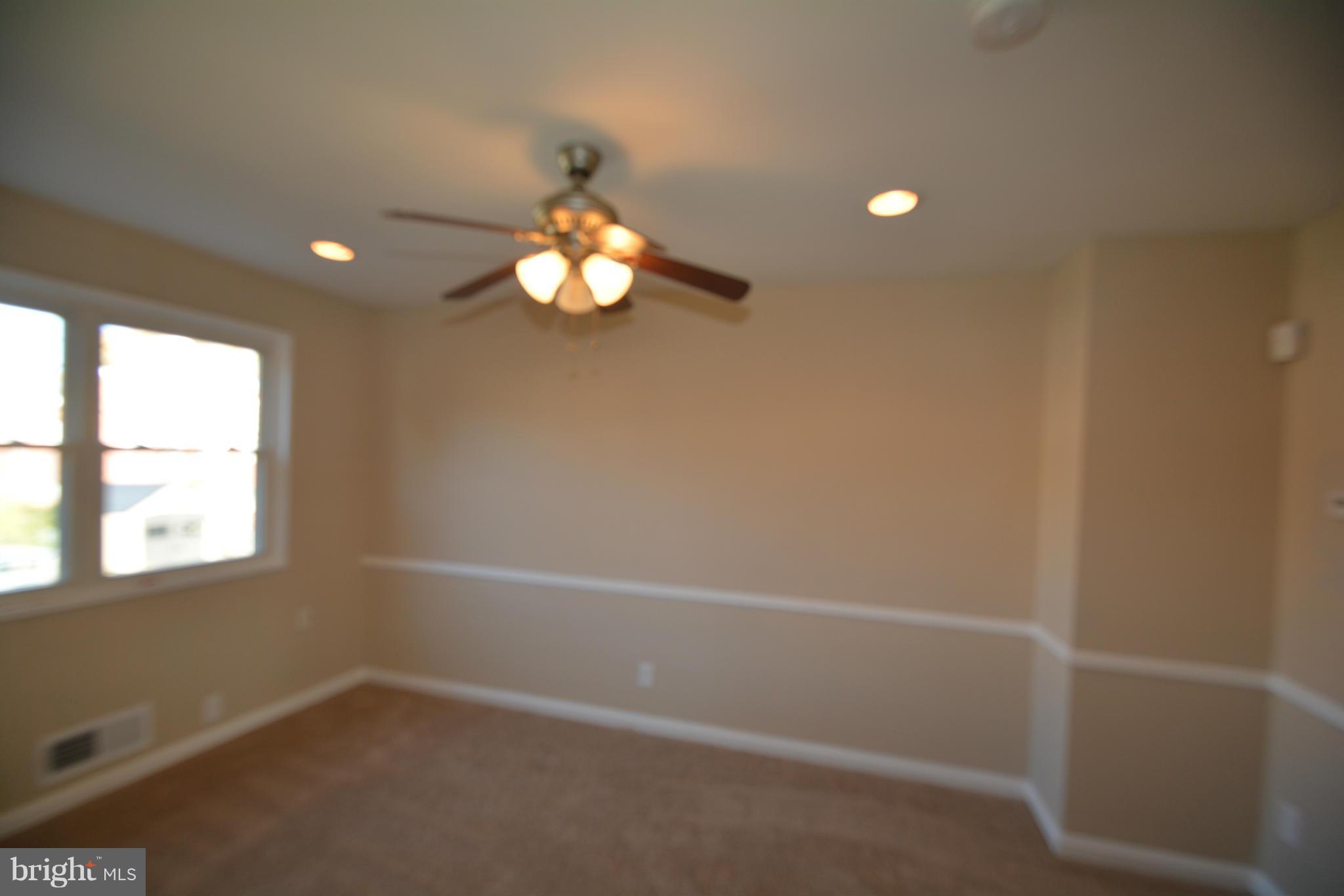 5454 Whitlock Road Baltimore, MD 21229 - Photo 23 of 30 an empty room with a window
