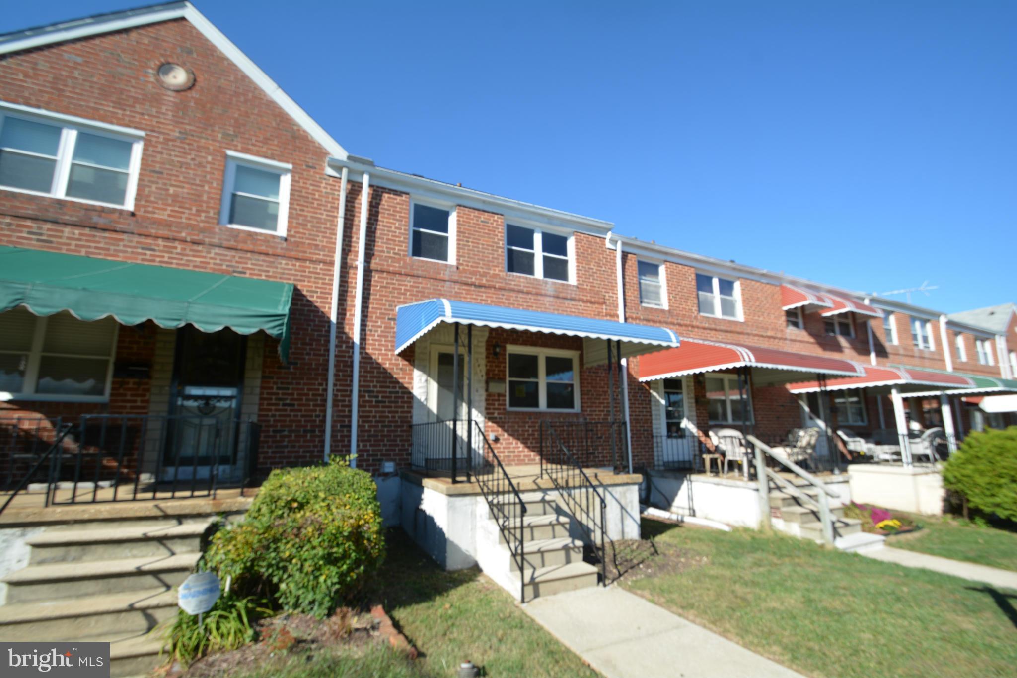 5454 Whitlock Road Baltimore, MD 21229 - Photo 3 of 30 a front view of a house with a yard