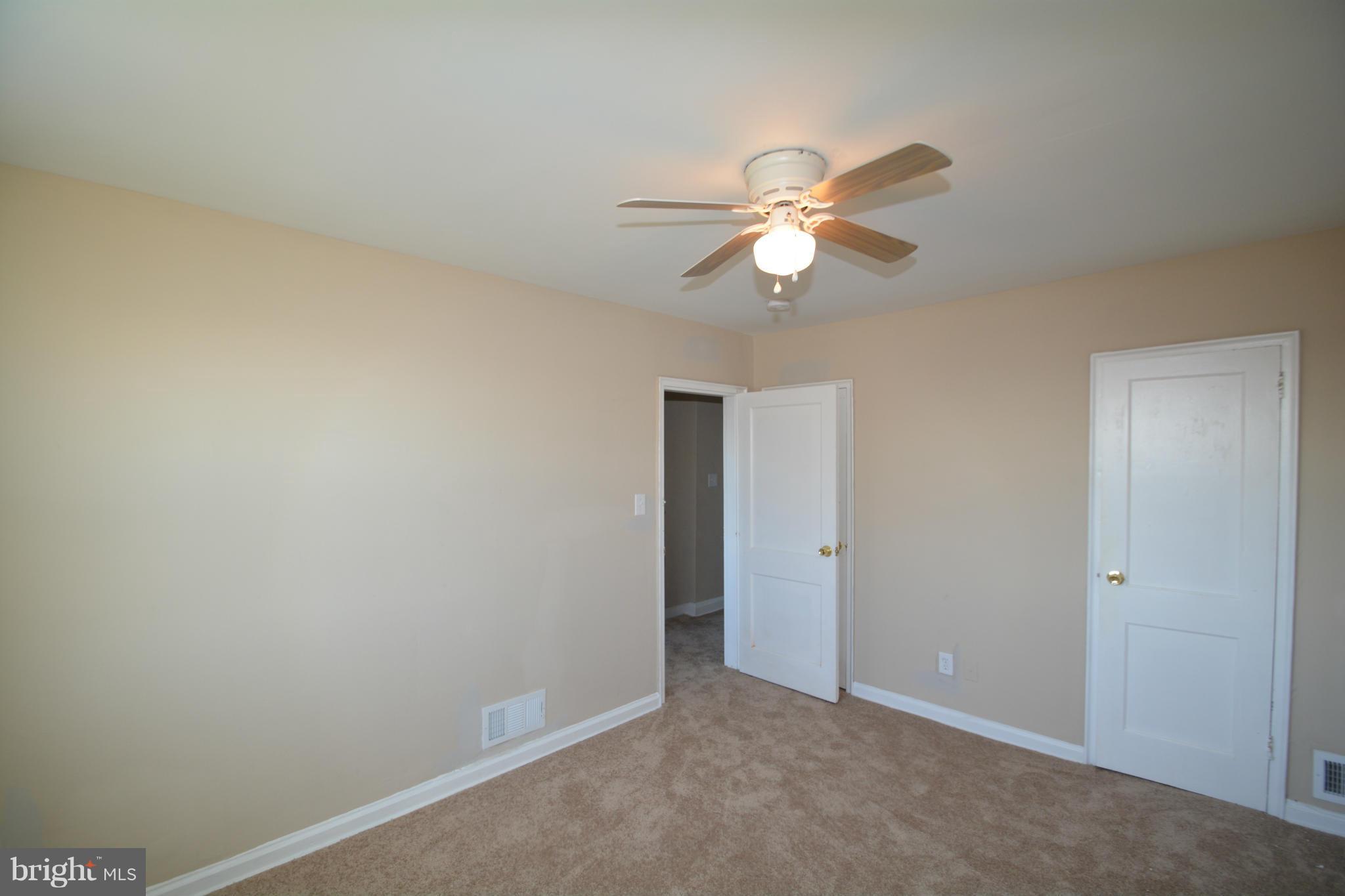 5454 Whitlock Road Baltimore, MD 21229 - Photo 9 of 30 a view of room with ceiling fan