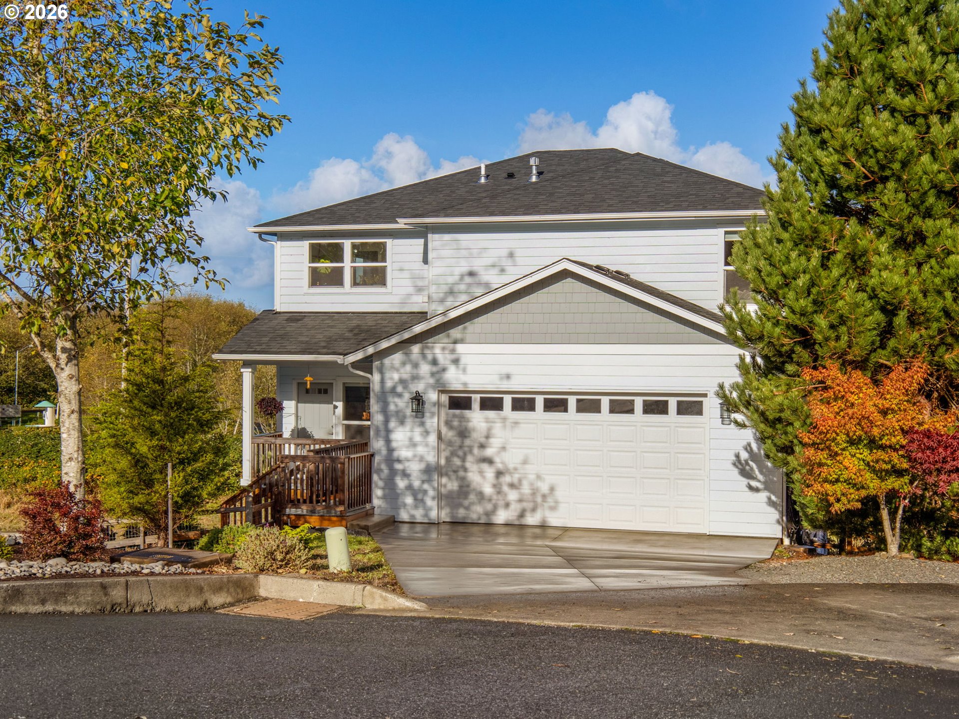 2188 Stanley Lake Court Seaside, OR 97138 - Photo 1 of 46 a view of a house with a yard plants and large tree