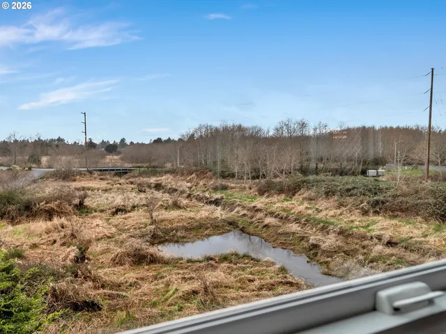 a view of a backyard of a house