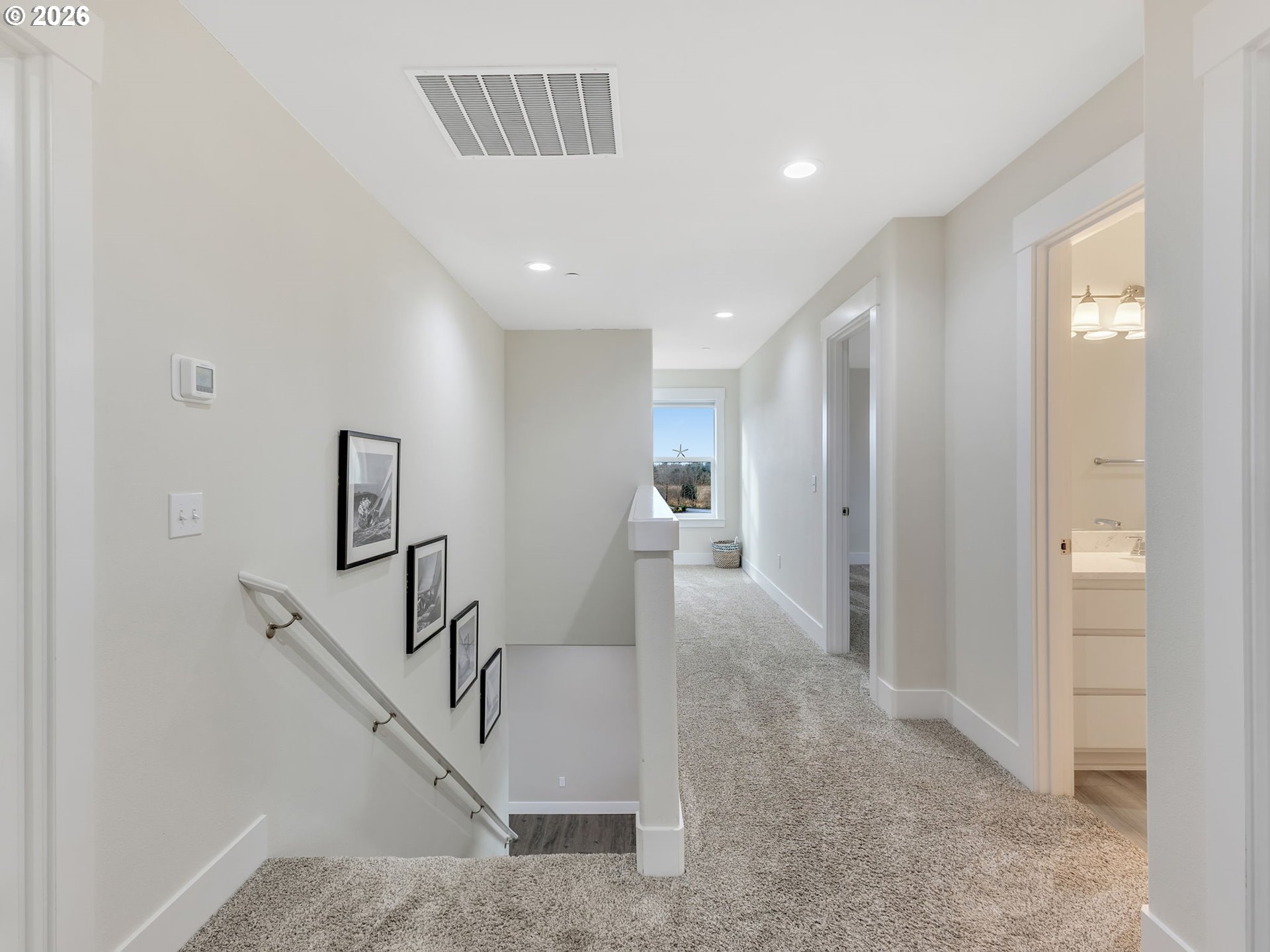2188 Stanley Lake Court Seaside, OR 97138 - Photo 24 of 46 a view of a hallway with staircase