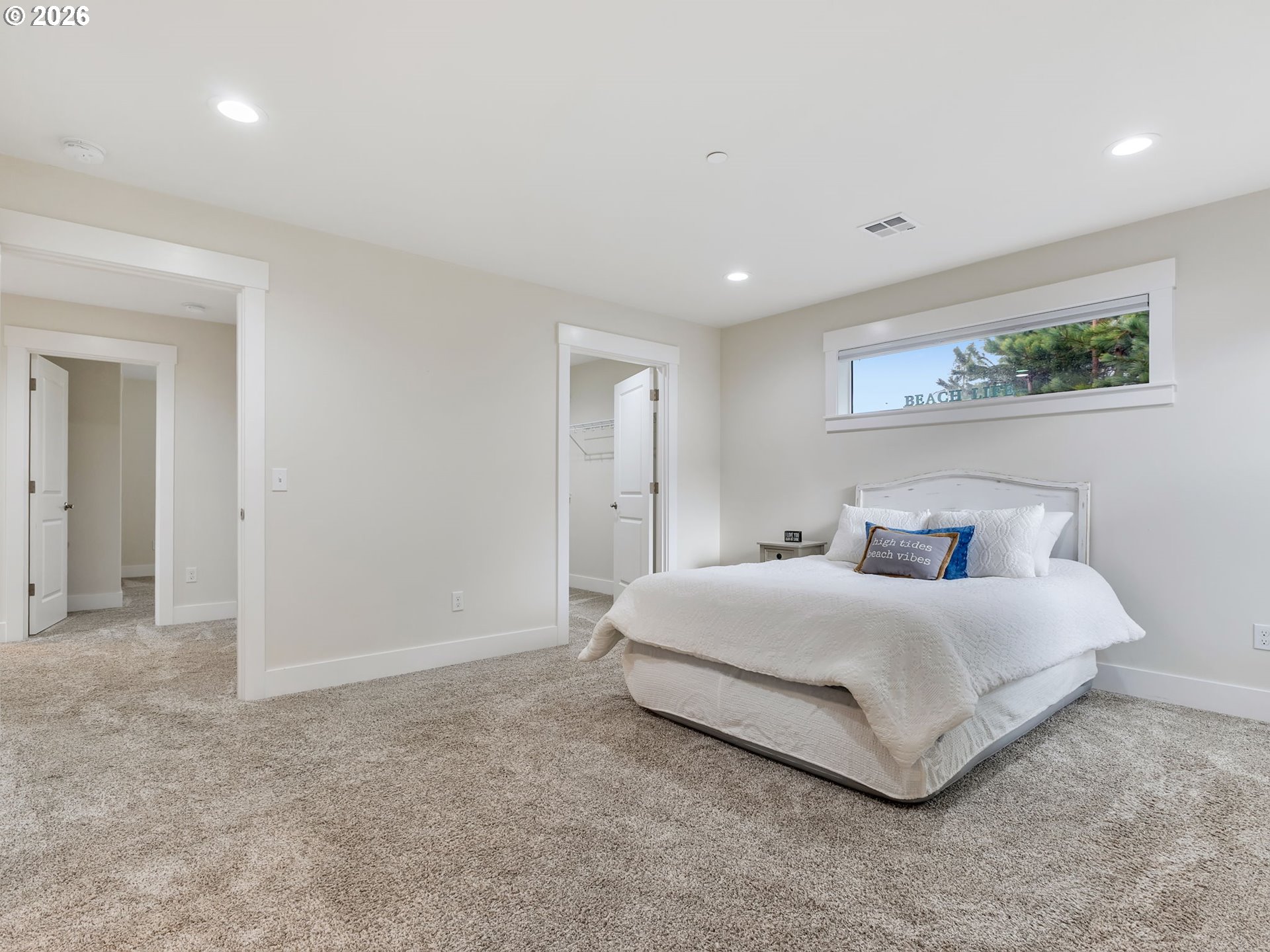 2188 Stanley Lake Court Seaside, OR 97138 - Photo 27 of 46 a bedroom with a bed and a painting