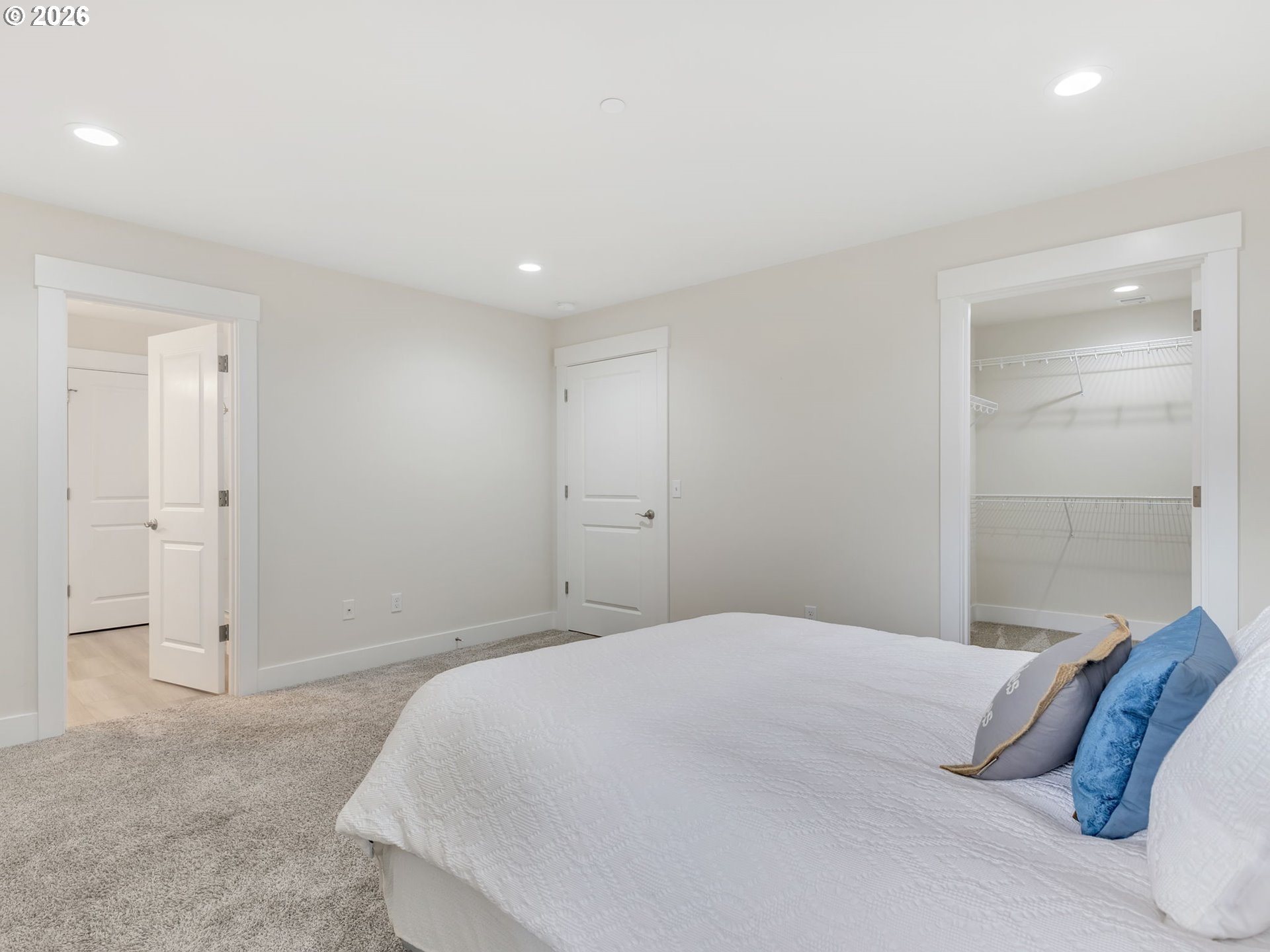 2188 Stanley Lake Court Seaside, OR 97138 - Photo 28 of 46 a bedroom with a bed and a night stand