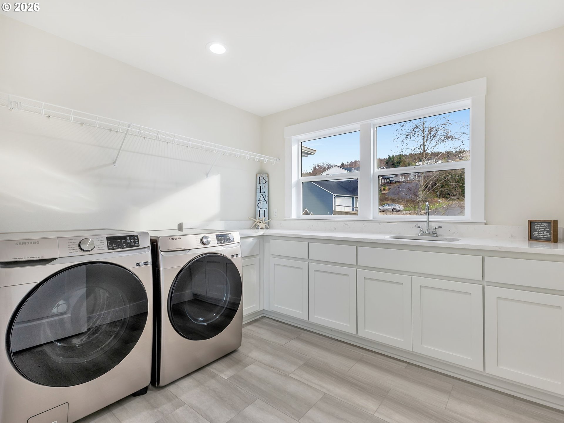2188 Stanley Lake Court Seaside, OR 97138 - Photo 38 of 46 a utility room with dryer and washer