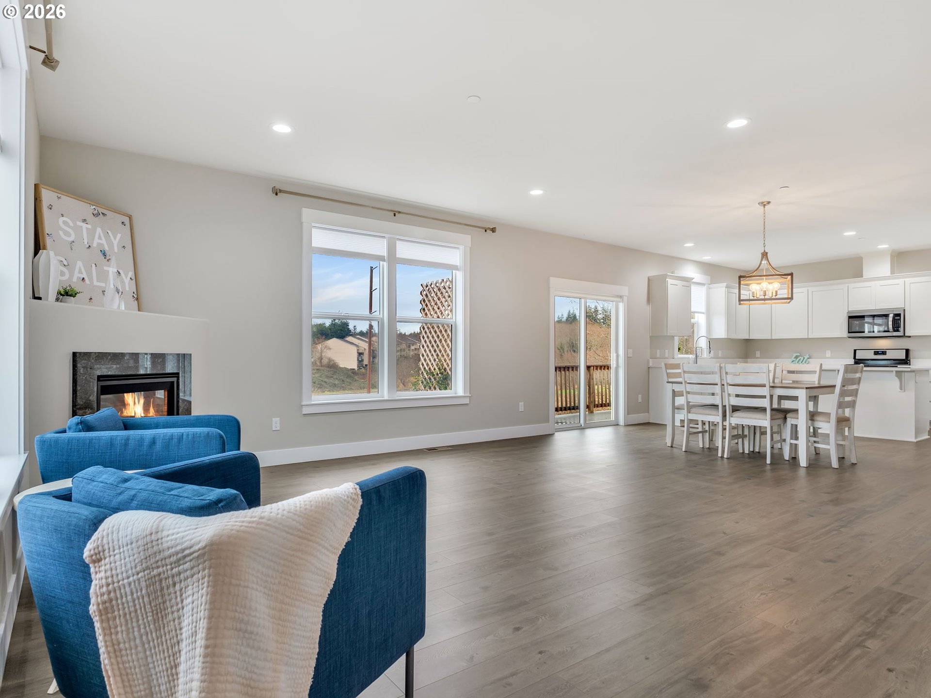 2188 Stanley Lake Court Seaside, OR 97138 - Photo 5 of 46 a living room with furniture and kitchen view