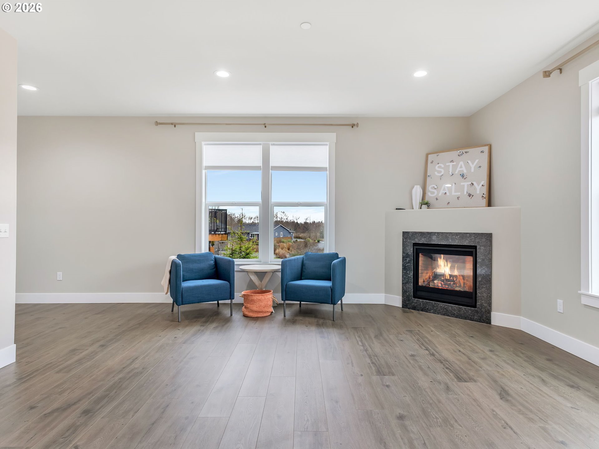 2188 Stanley Lake Court Seaside, OR 97138 - Photo 7 of 46 a living room with furniture and a fireplace