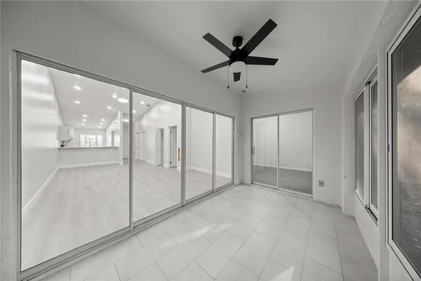 a view of an empty room and window