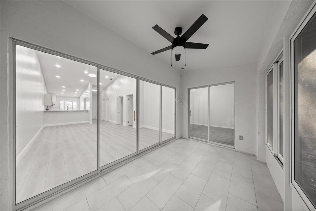 10441 Southwest 85th Court Ocala, FL 34481 - Photo 17 of 32 a view of an empty room and window