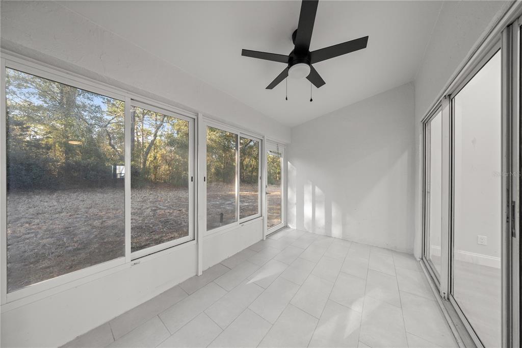 10441 Southwest 85th Court Ocala, FL 34481 - Photo 18 of 32 a view of a room with window