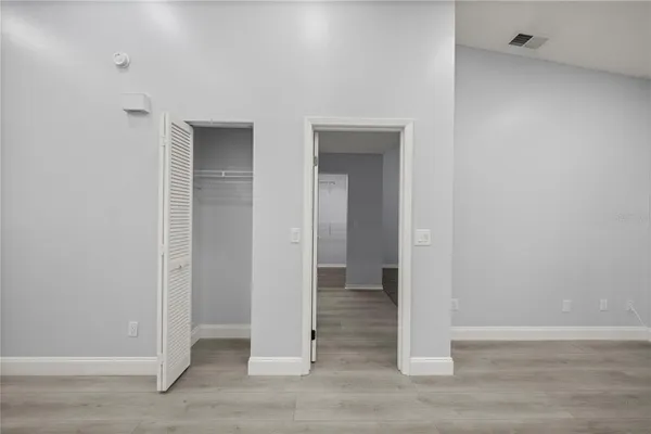 a view of a bathroom with wooden floor