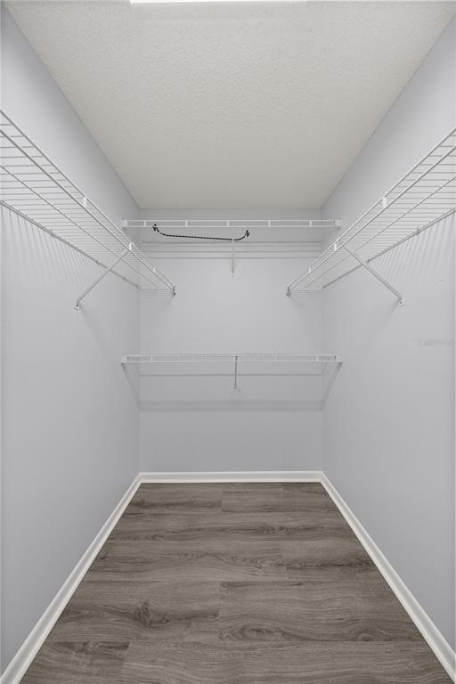 10441 Southwest 85th Court Ocala, FL 34481 - Photo 24 of 32 a view of a room with empty racks